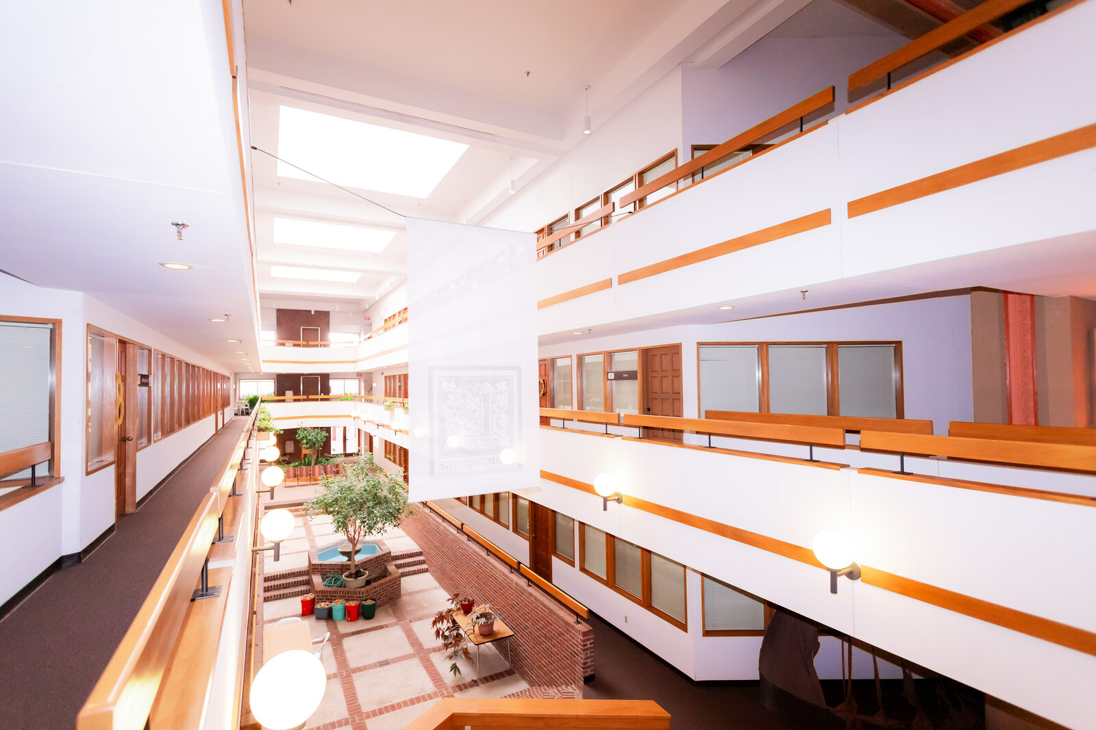 View across the skylit atrium galleries at Lyric Square in Anniston, Alabama