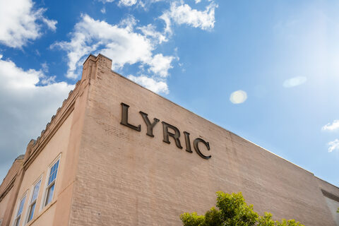 The historic LYRIC lettering on the facade